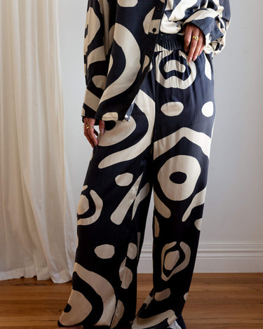 Full length view of KENI Sleepwear Bright Eyes Silk Pants - long legs, luxury mulberry silk, relaxed fit