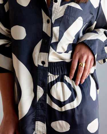 Close up waistband details of KENI Sleepwear Bright Eyes Silk Pants - relaxed fit for ultimate comfort and styling options