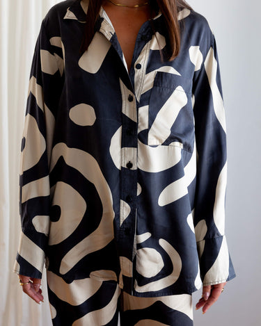 Clean studio shot of KENI Sleepwear Bright Eyes Silk Shirt - relaxed fit, 100% mulberry silk, luxurious feel and design