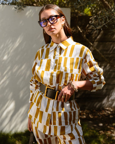 Pebbles long sleeve linen shirt styled with belt for maximum versatility