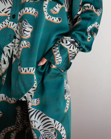 Close up of the Tigris Green Silk Shirt - showing button and cuff details, relaxed fit and statement colours