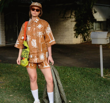 Cashew Linen Shirt worn casually with matching KENI shorts for effortless style