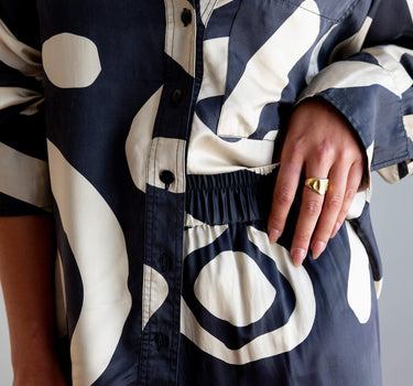 Close up waistband details of KENI Sleepwear Bright Eyes Silk Pants - relaxed fit for ultimate comfort and styling options