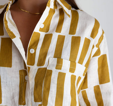 Close up detail Pebbles linen shirt easy transition from sleep to street