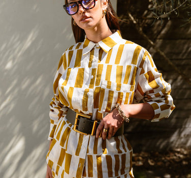 Pebbles long sleeve linen shirt styled with belt for maximum versatility