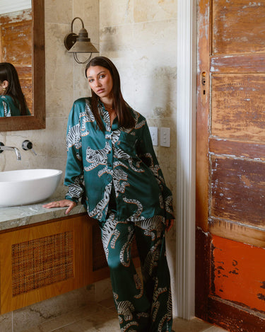 Luxurious Tigris Green Silk Pants paired with the matching silk shirt designed as statement pieces for the home or to wear out