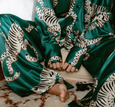 Close-up of Tigris Green Silk Pants by KENI Sleepwear highlighting the luxurious mulberry silk fabric and fine craftsmanship.